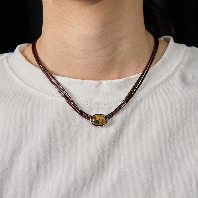Collana con ciondolo in corda di cera con protezione ellittica in occhio di tigre naturale Buddha Stones - Image 5