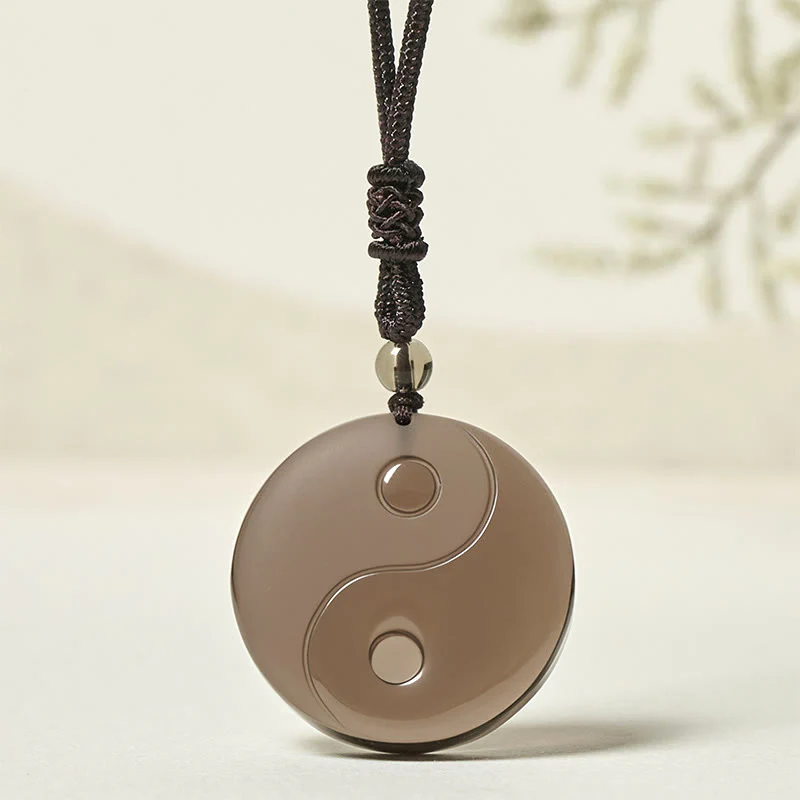 Collana con ciondolo positivo in ossidiana di ghiaccio e simbolo Yin Yang Buddha Stones