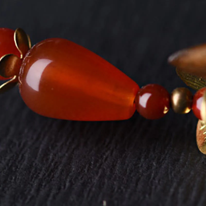 Forcina per capelli lenitiva con nappa in argento e sandalo verde Buddha Stones - Image 13