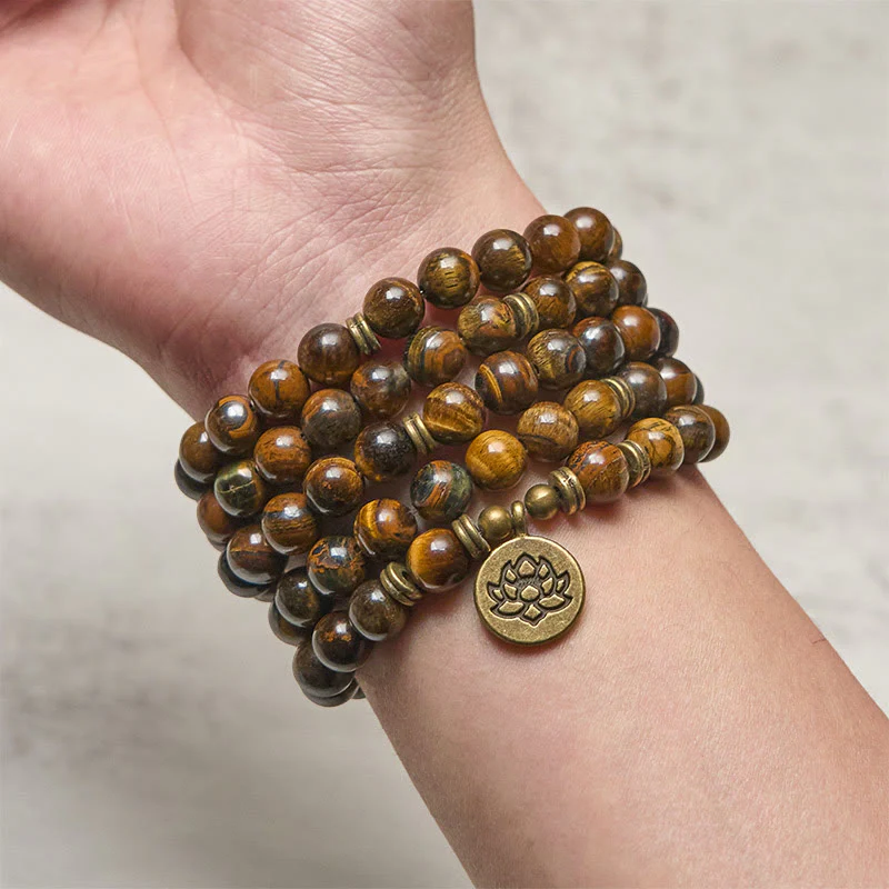 Mala con perline di occhio di tigre, simbolo di loto Buddha Stones - Image 4