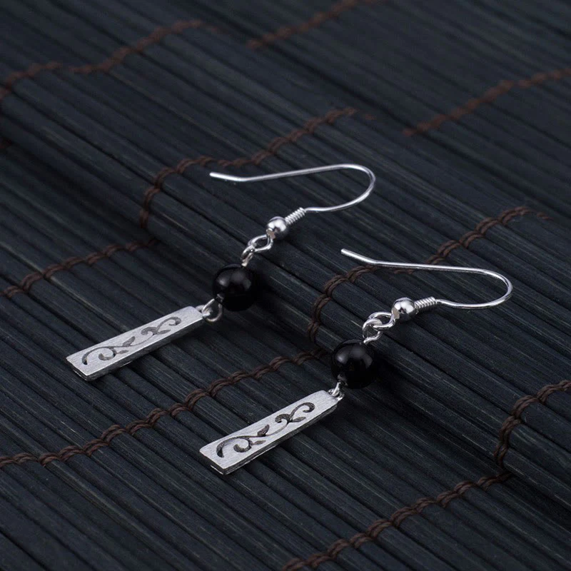 Orecchini pendenti con protezione a forma di vite cava in onice nero in argento sterling 925 Buddha Stones - Image 5