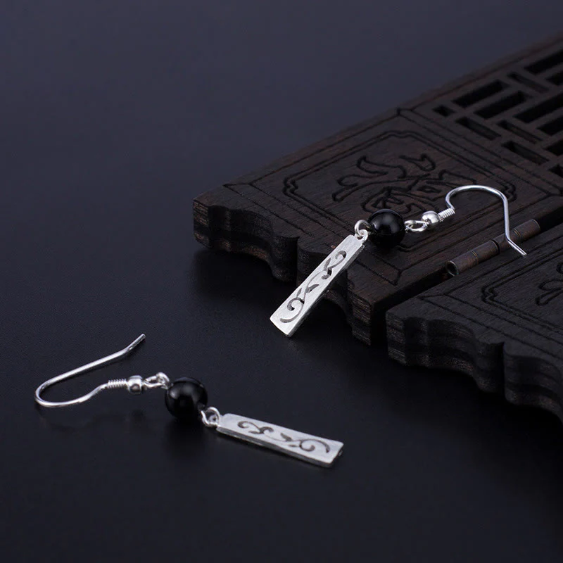 Orecchini pendenti con protezione a forma di vite cava in onice nero in argento sterling 925 Buddha Stones - Image 6