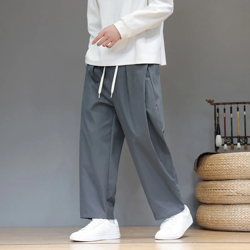 Pantaloni harem da uomo con tasche e gamba dritta, tinta unita, modello Buddha Stones Fall