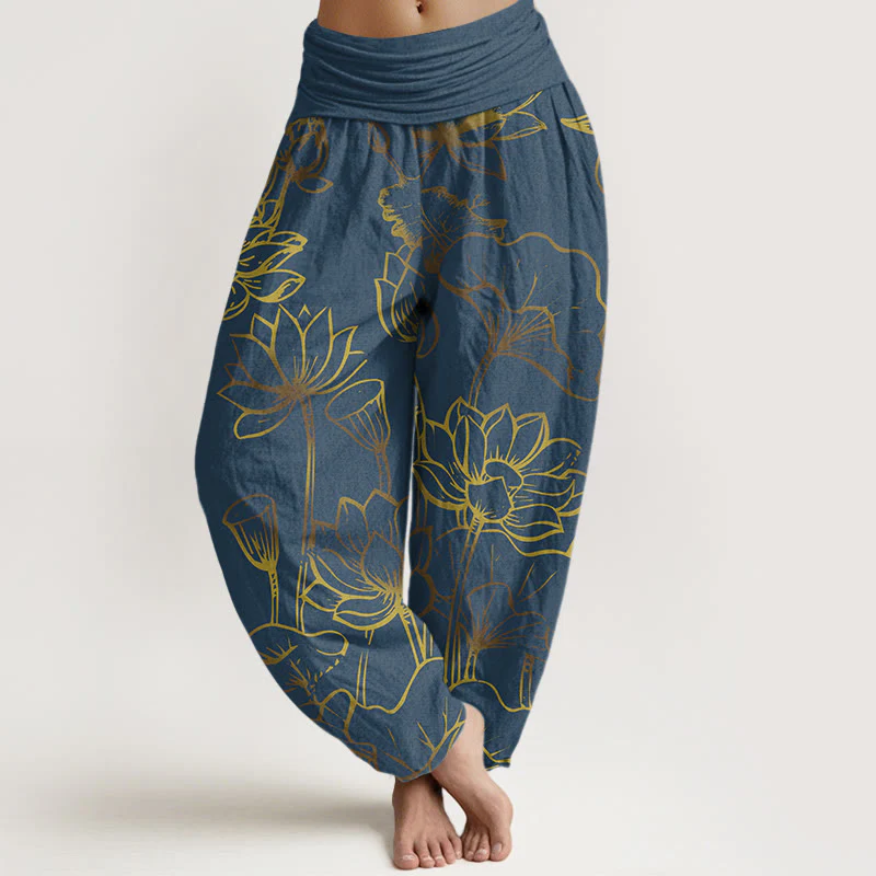Pantaloni harem in cotone con elastico in vita e motivo a foglie e fiori di loto con stampa di Buddha Stones da donna
