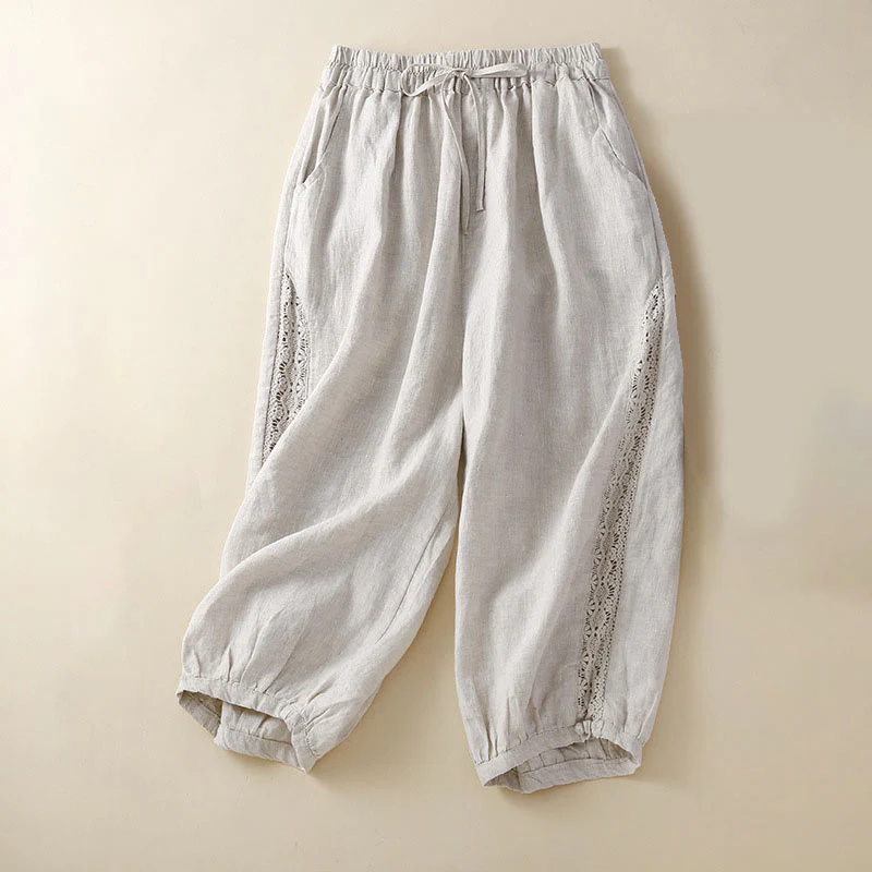 Pantaloni harem larghi con coulisse e tasche, motivo floreale in tinta unita con Buddha Stones